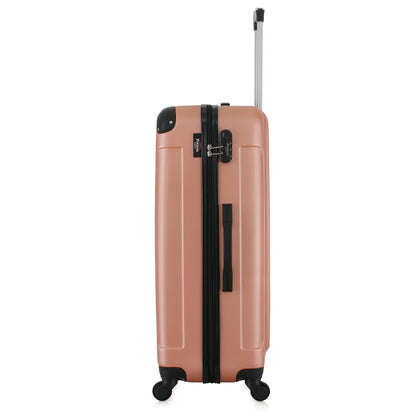 Grande valise rose de côté
