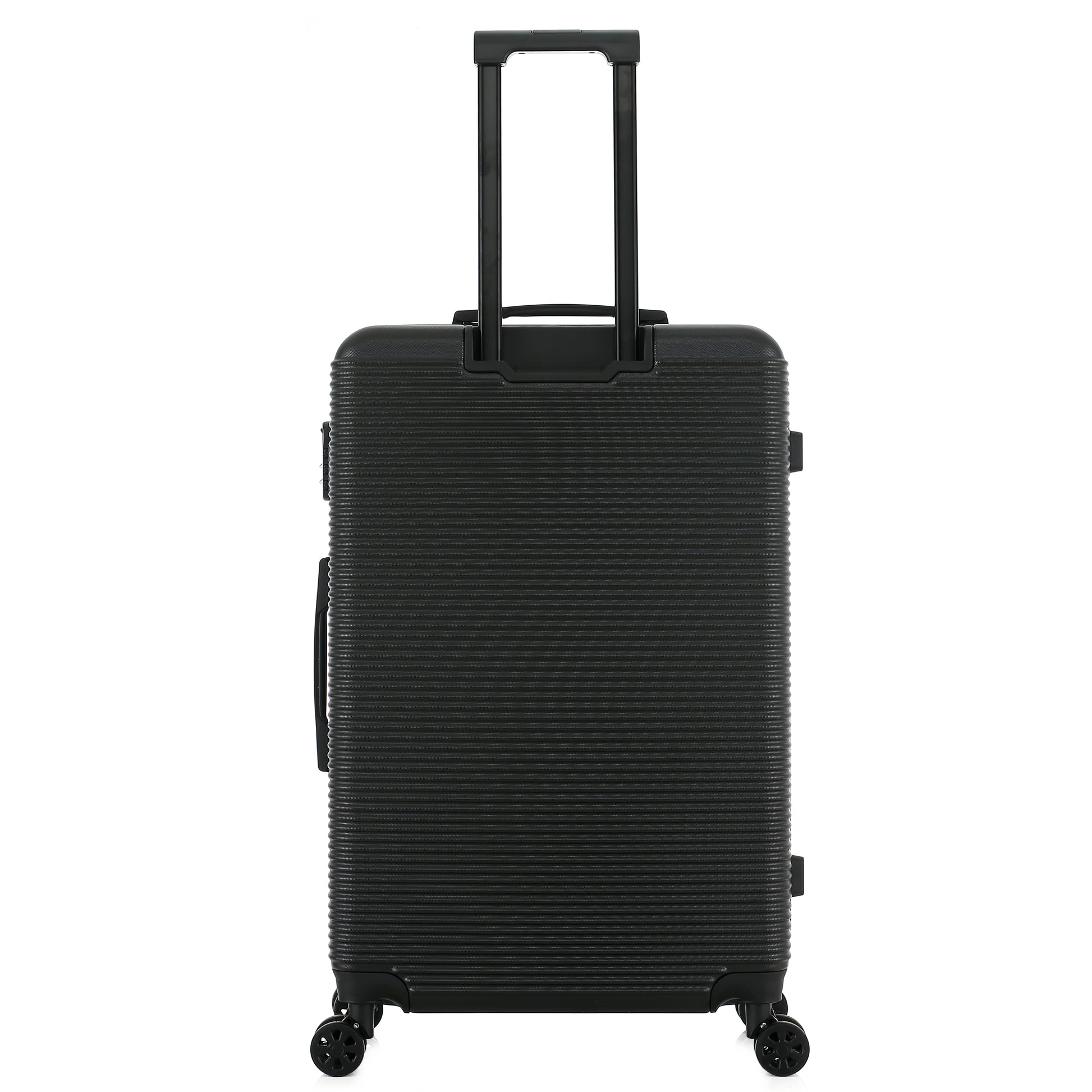 Grande valise noire de dos
