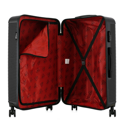Grande valise noire ouverte
