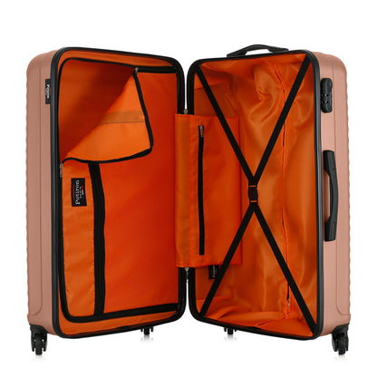 Grande valise rose ouverte
