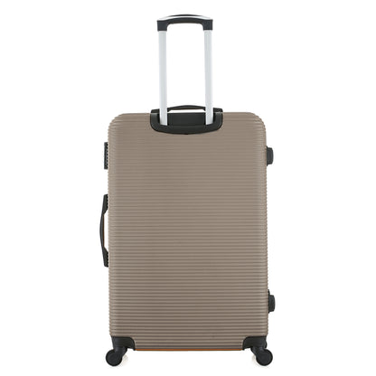 Grande valise beige de dos
