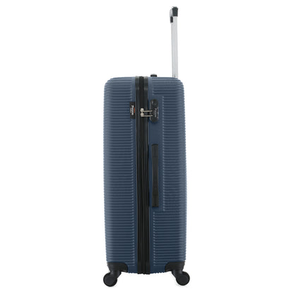 Grande valise bleue de côté
