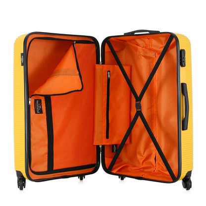 Grande valise jaune ouverte
