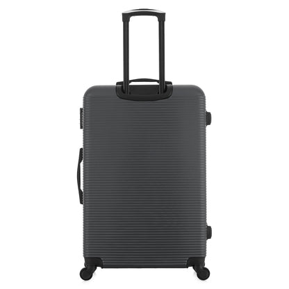 Grande valise grise de dos
