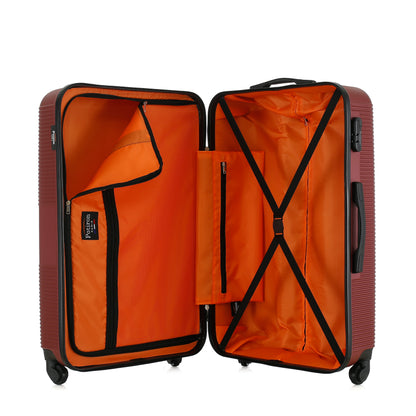 Grande valise bordeaux ouverte
