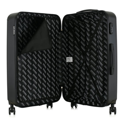 Grande valise noire ouverte
