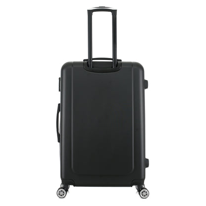 Grande valise noire de dos
