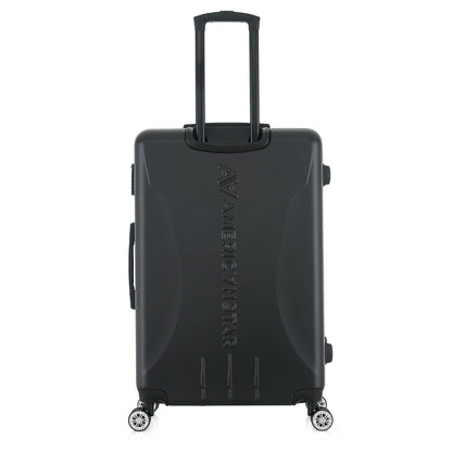 Grande valise noire de dos

