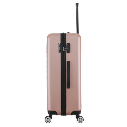 Grande valise rose de côté
