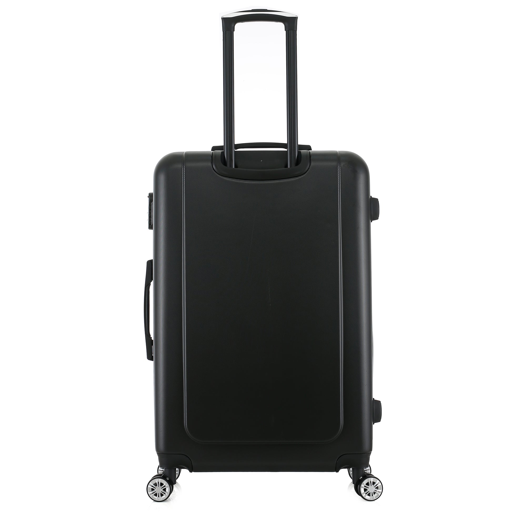 Grande valise noire de dos
